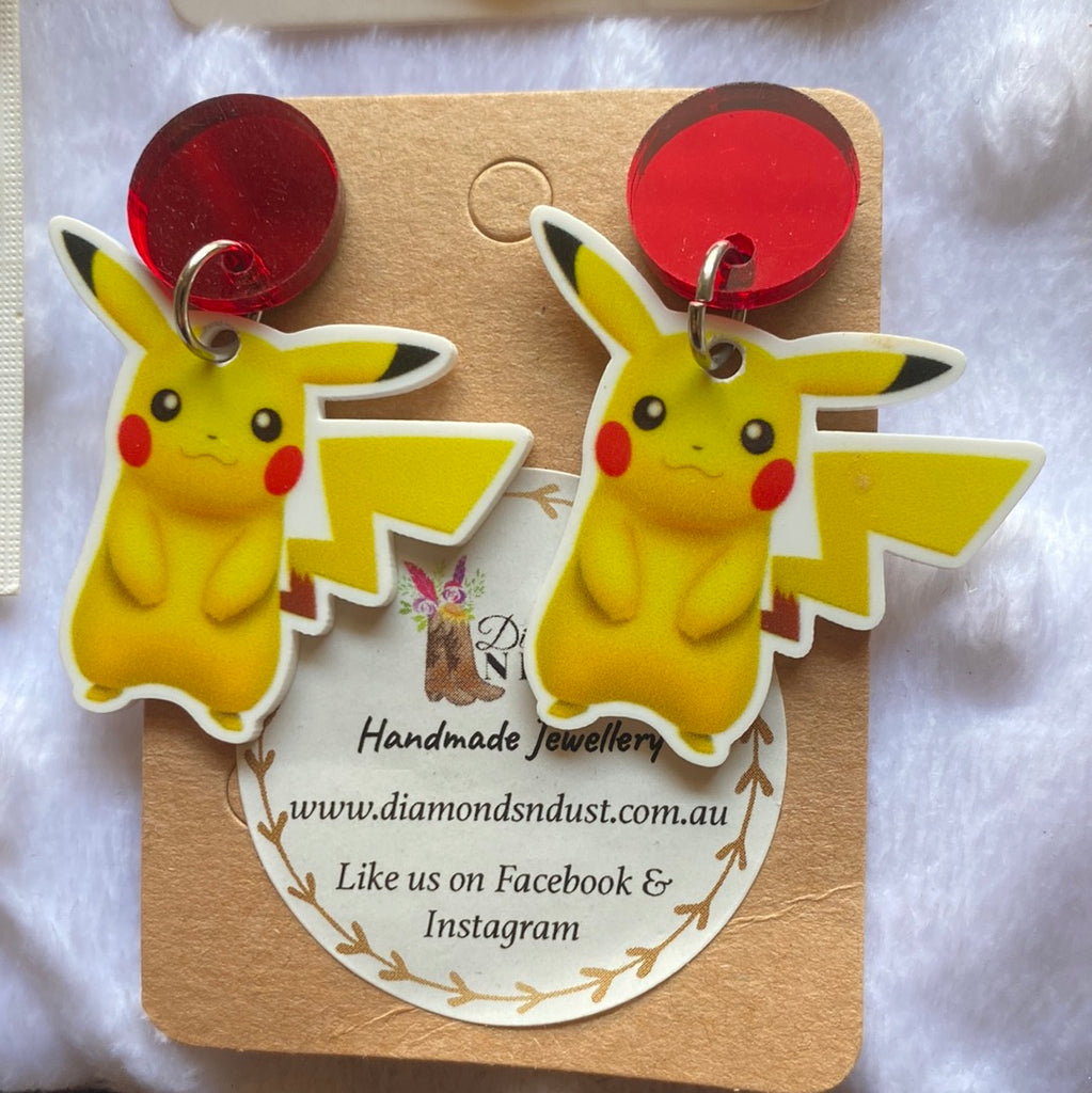 Yellow character dangle earrings